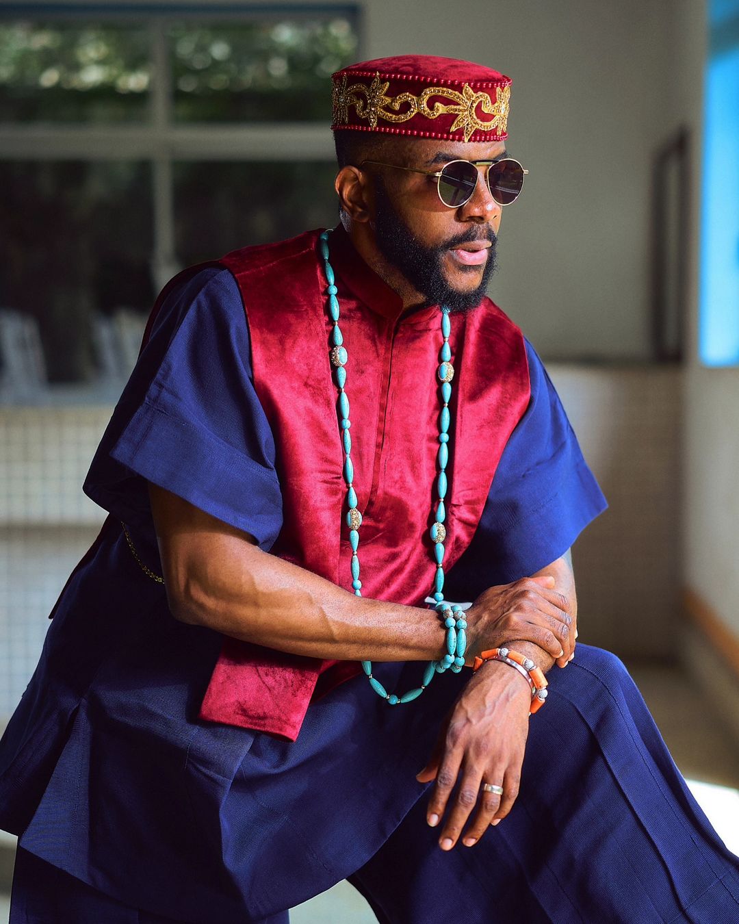 Ebuka Slays BBNaija9 Eviction Night in Ugo Monye’s Wide-Legged Trousers & Bold Red Accent